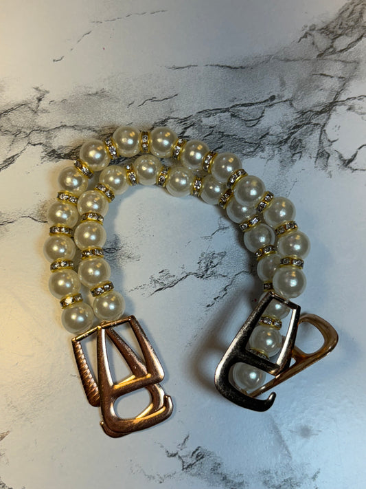 Gold and Pearl Strap Attachments