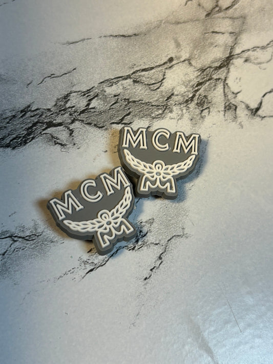 Grey MCM Charm